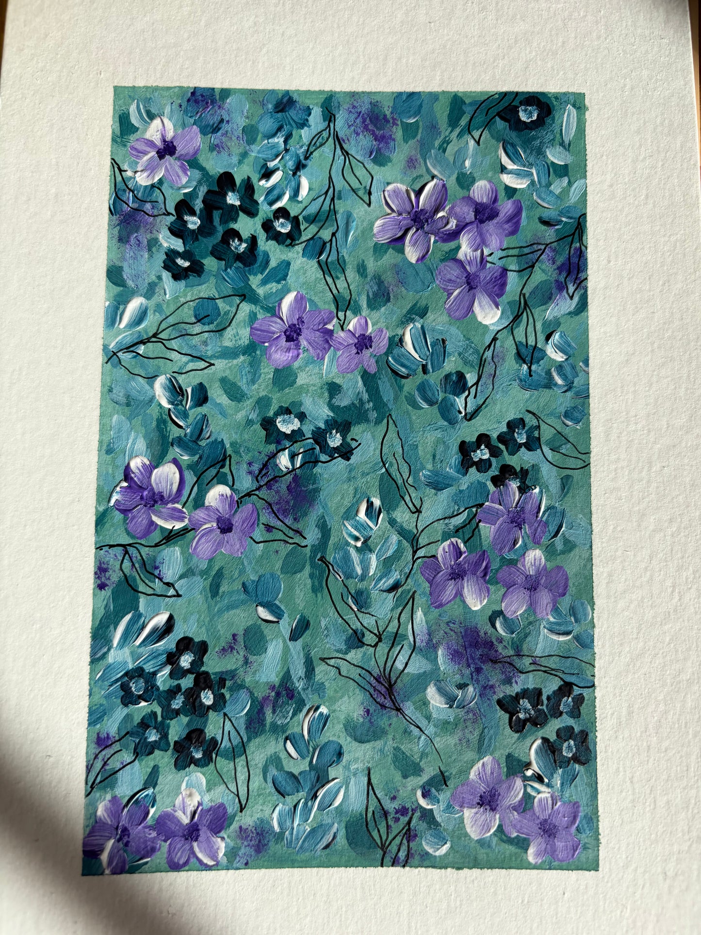 A5 Indigo, aqua, violet florals.